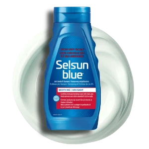 Le devant d'une bouteille de shampooing antipelliculaire Cuir chevelu sec et qui démange